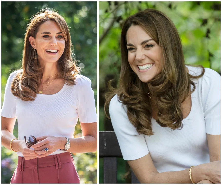 Kate Middleton in a white top and pink pants, smiling outdoors in a garden setting.