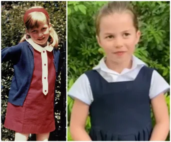 Two young girls standing outdoors, one in a red dress with a headband, the other in a navy pinafore with a white blouse.