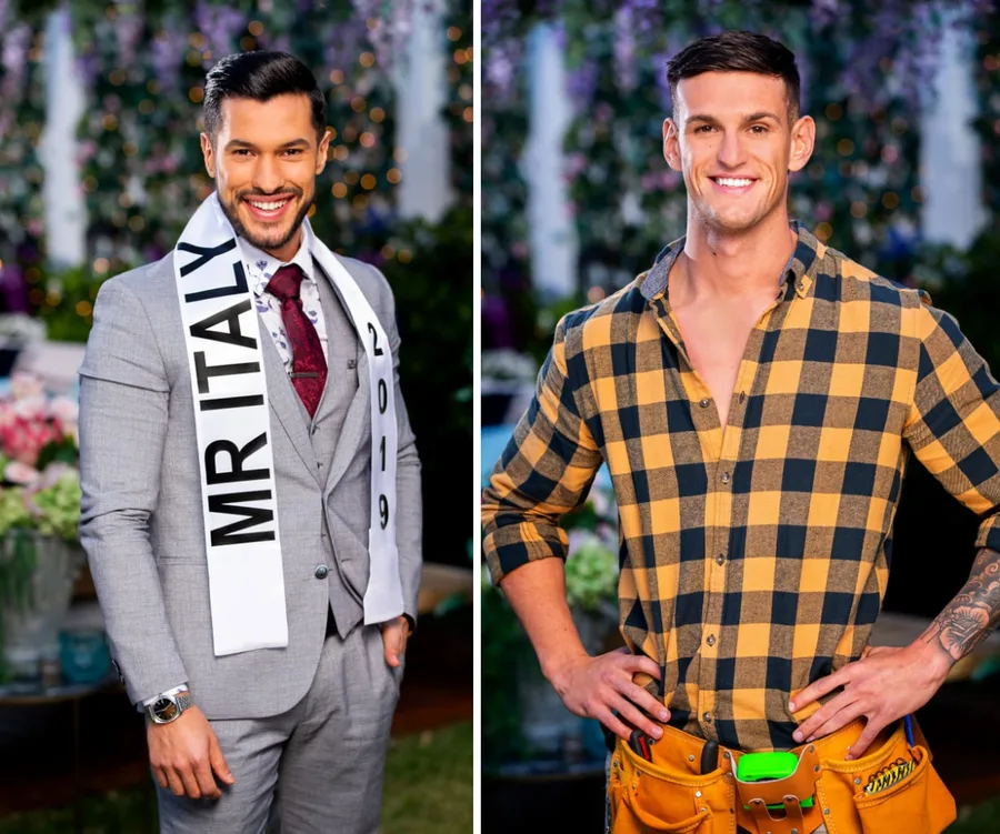 Two men posing; one in a suit with "Mr. Italy 2019" sash, the other in a checked shirt with tool belt, smiling.