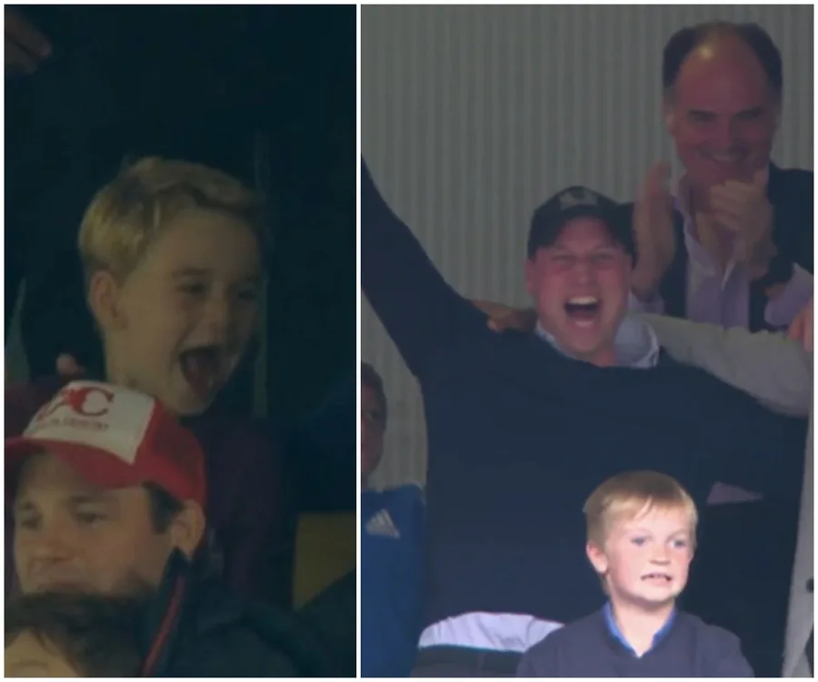 A group of people, including a child and an adult, cheer enthusiastically in a sports stadium.