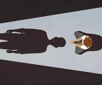 A person sitting in light casts a shadow of a standing figure, symbolizing coercive control.