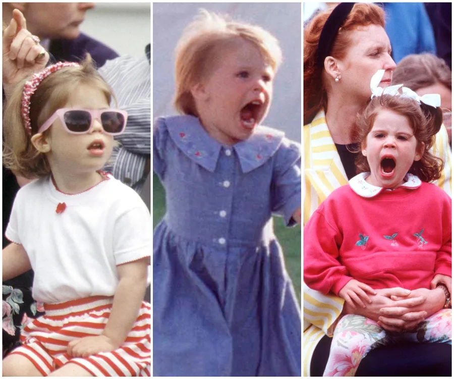 Young Princess Eugenie in sunglasses, a blue dress, and a red sweatshirt with ribbons, expressing playful joy.