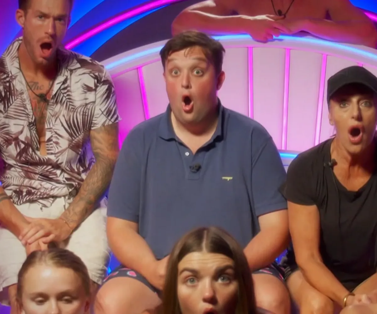 Contestants from Big Brother Australia 2021 with shocked expressions on their faces.