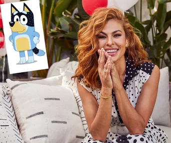 Eva Mendes smiling outdoors with a cartoon image of Bluey the blue heeler from the animated series in the top left corner.