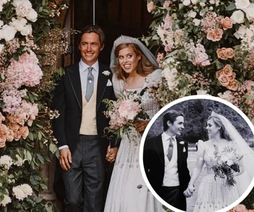 Princess Beatrice and Edoardo smiling in wedding attire, surrounded by floral arch.