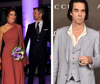 A woman in a red dress with a bouquet and a man in a suit, alongside a man in a light blue suit against a backdrop.