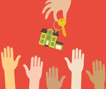 Hands reaching for a house key on a red background, illustrating reverse mortgage concept.