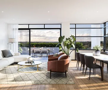 Modern living room with large windows, cozy seating, dining area, and a balcony view of greenery and sky.