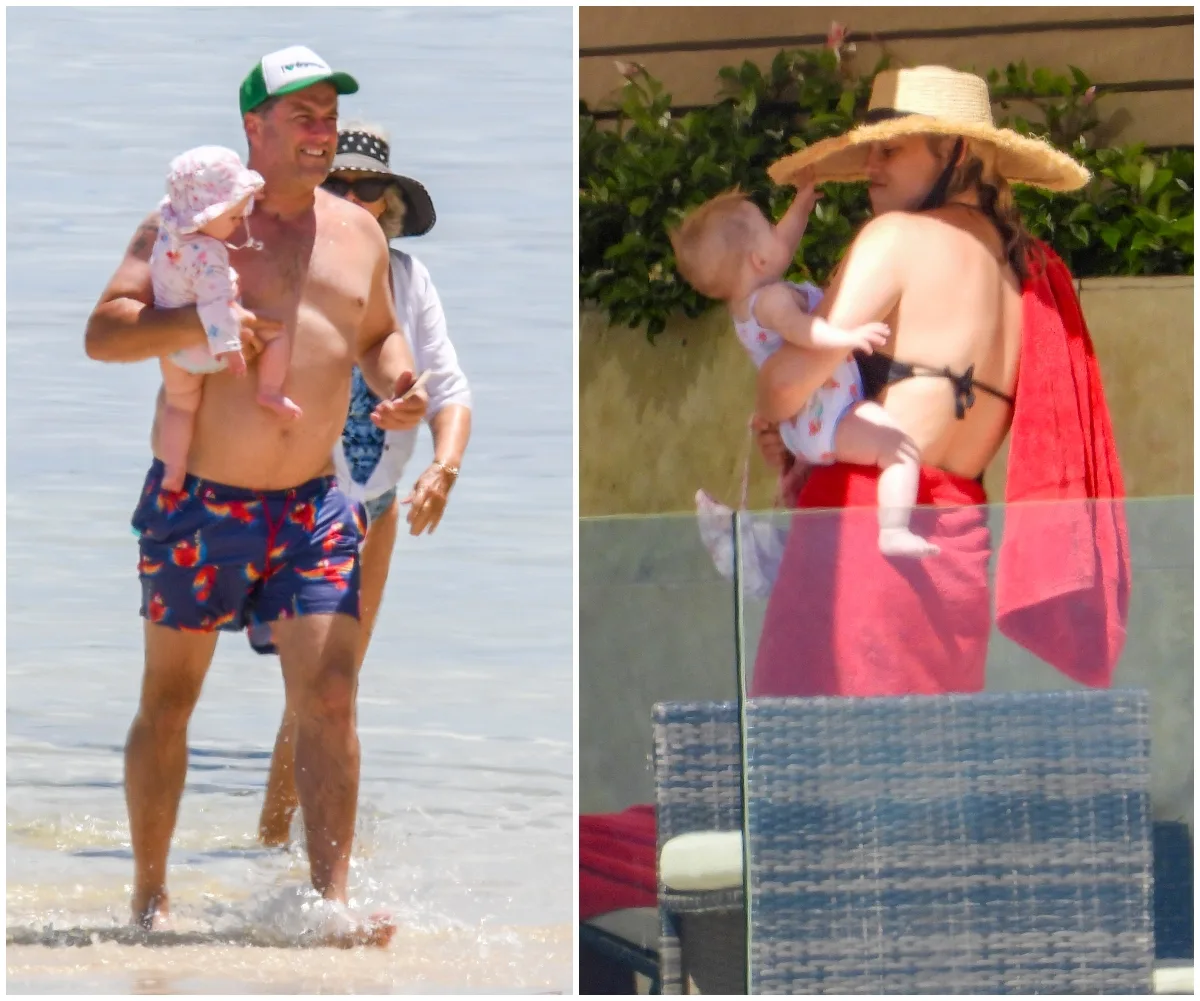 Man holding baby in ocean; woman with baby by poolside wearing sunhat, wrapped in a red towel.