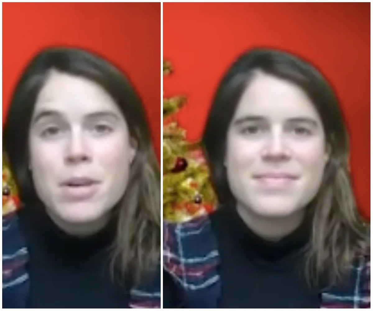 A woman speaking in front of a festive background with a red backdrop and decorated Christmas tree.