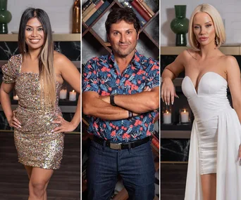 Three individuals from a TV reunion, each posing in formal attire against a backdrop of shelves and candles.