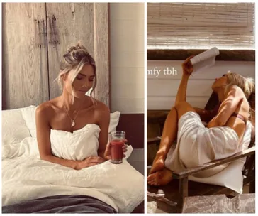 A woman sits on a bed holding a drink and relaxes in a chair reading, both wrapped in white sheets.