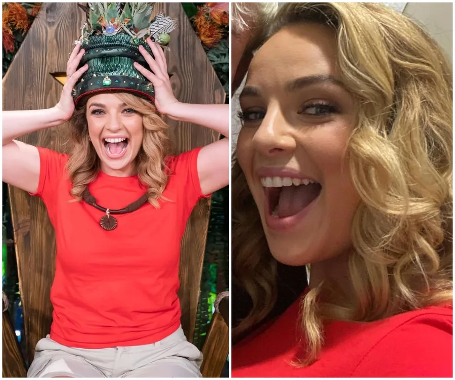 Abbie Chatfield celebrates her win on "I'm a Celebrity 2021," wearing a crown and red shirt, smiling widely.