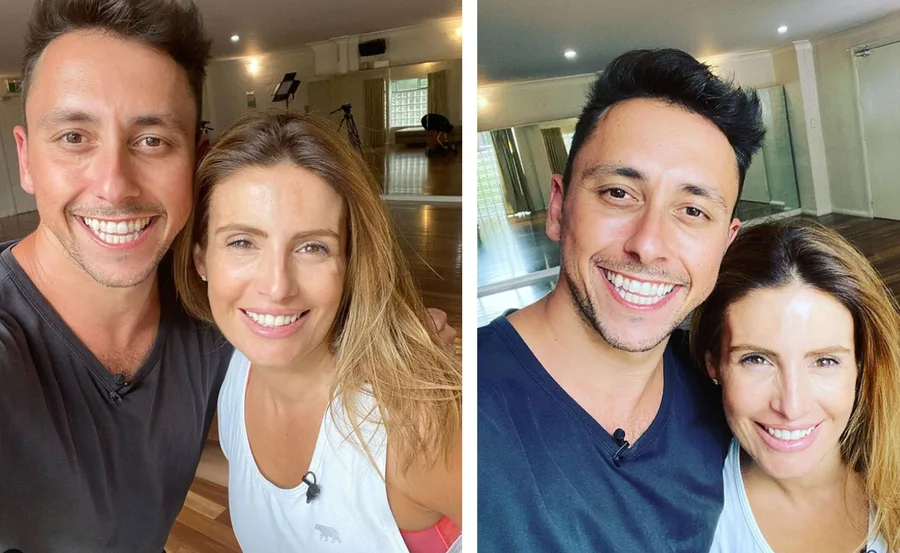Two smiling individuals taking selfies in a bright dance studio, preparing for "Dancing with the Stars" 2021.