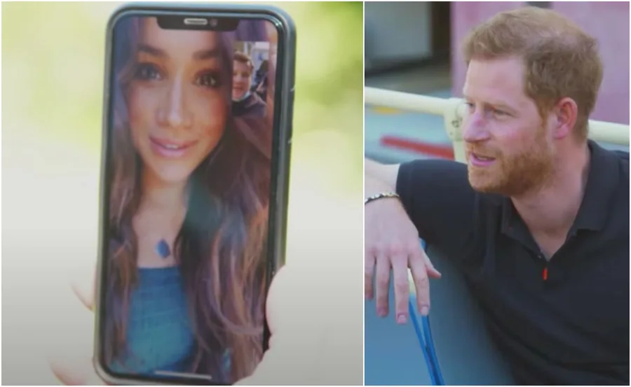 A woman on a phone screen in a blue dress and a man in a black shirt sitting outdoors, engaging in a conversation.