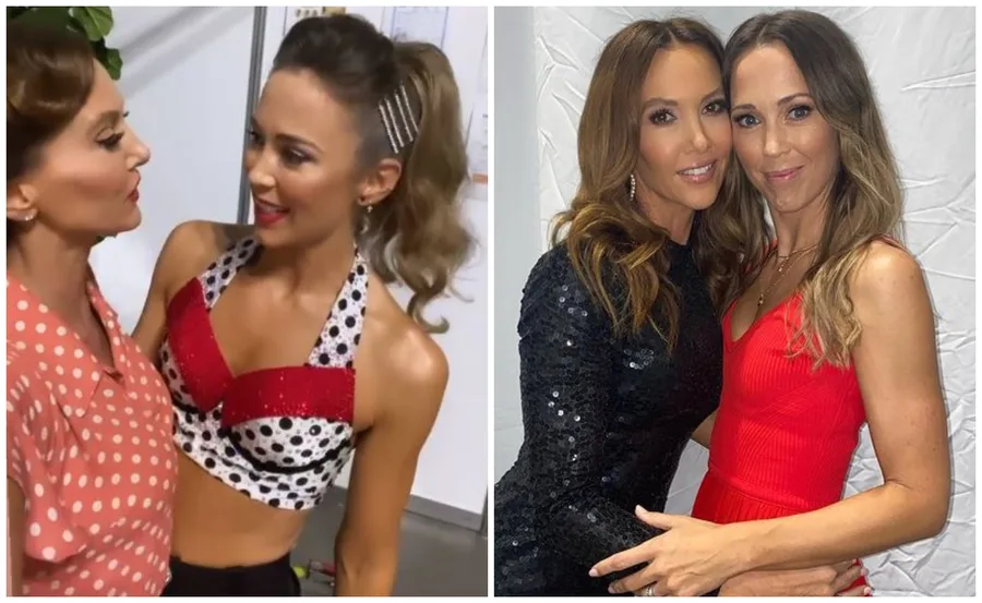 Two women in stylish outfits, one wearing a polka-dotted top, the other in a black sequin dress, smiling together.