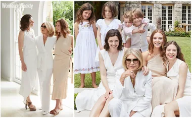 Women in elegant outfits with children outdoors, exuding happiness and warmth.