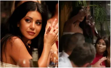 Two images; a woman with long black hair seated at a dinner party, and later pouring a drink, surprising another guest.