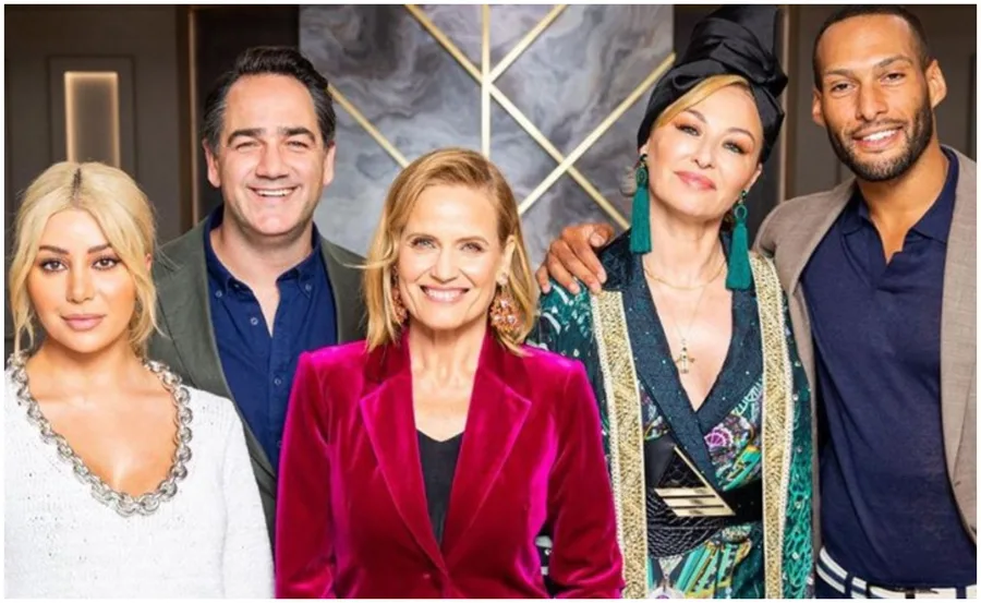 A group of five smiling individuals in colorful and stylish outfits, with a decorative background.