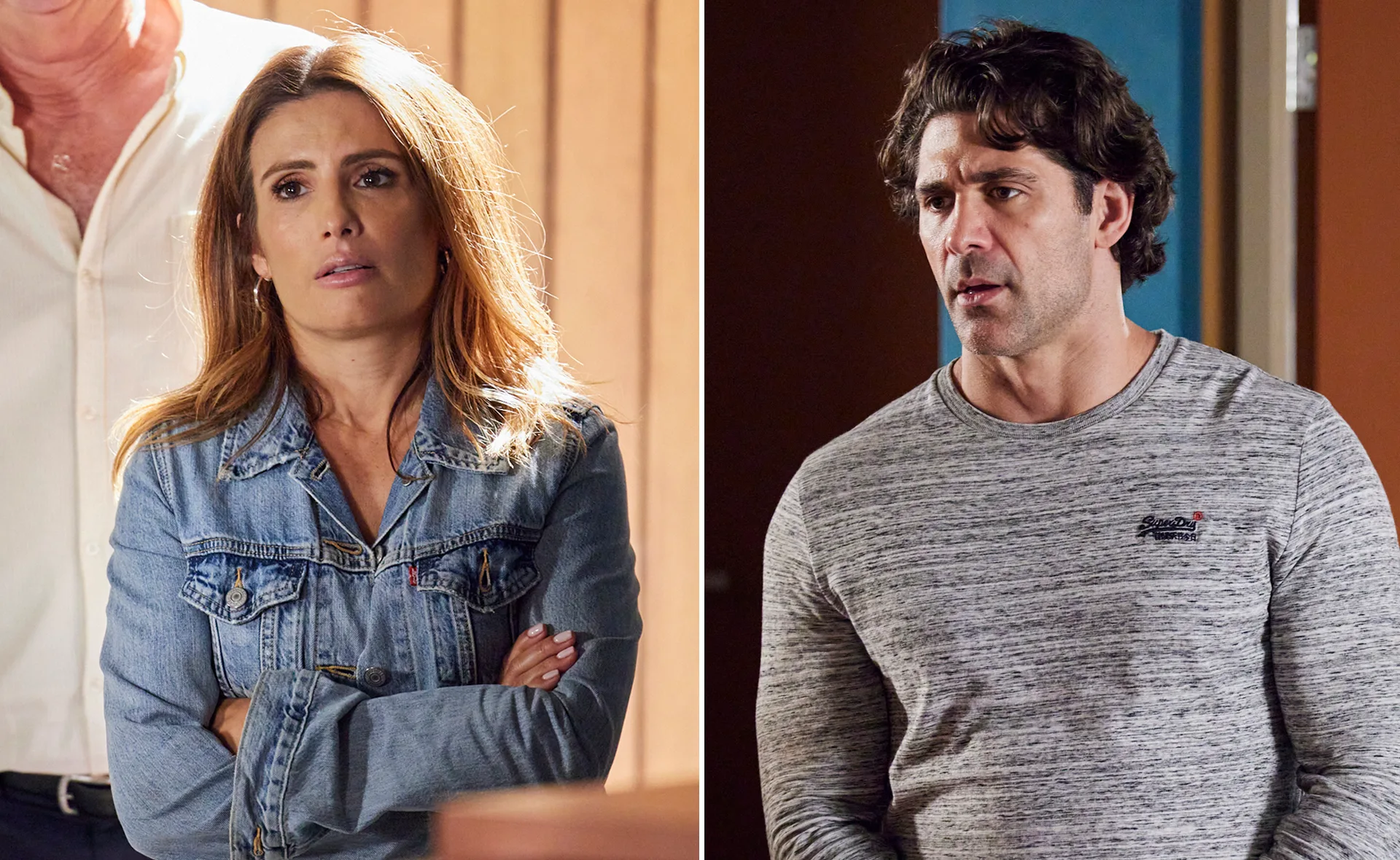 A woman in a denim jacket and a man in a grey sweater stand apart, both with serious expressions indoors.