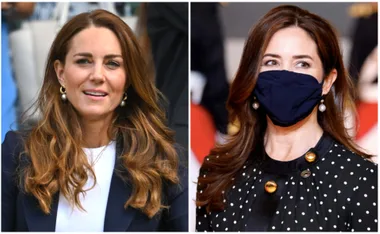 "Two women with brown hair, one wearing a mask and polka dot outfit, both with pearl earrings."