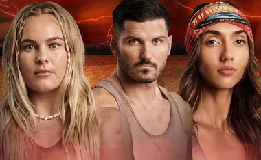 Three people stand together against a dramatic red sky, one wearing a "Survivor" headband.