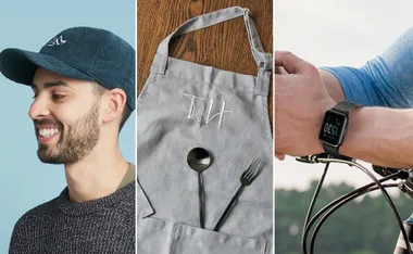 Man wearing a cap, an apron with utensils, and a person with a smartwatch on a bike handle.