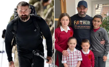Man hiking in mountains; father with four kids in school uniforms.