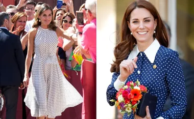 Two women in polka dot dresses, one in a crowd and the other holding flowers, both smiling.