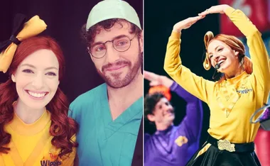 Young woman in yellow Wiggles outfit with large bow, man in scrubs; performing on stage with microphone.