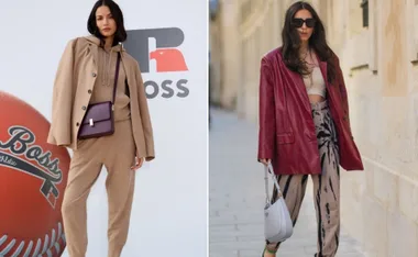 Two women in stylish outfits: left in beige with a brown bag, right in a red jacket and patterned pants with a white bag.