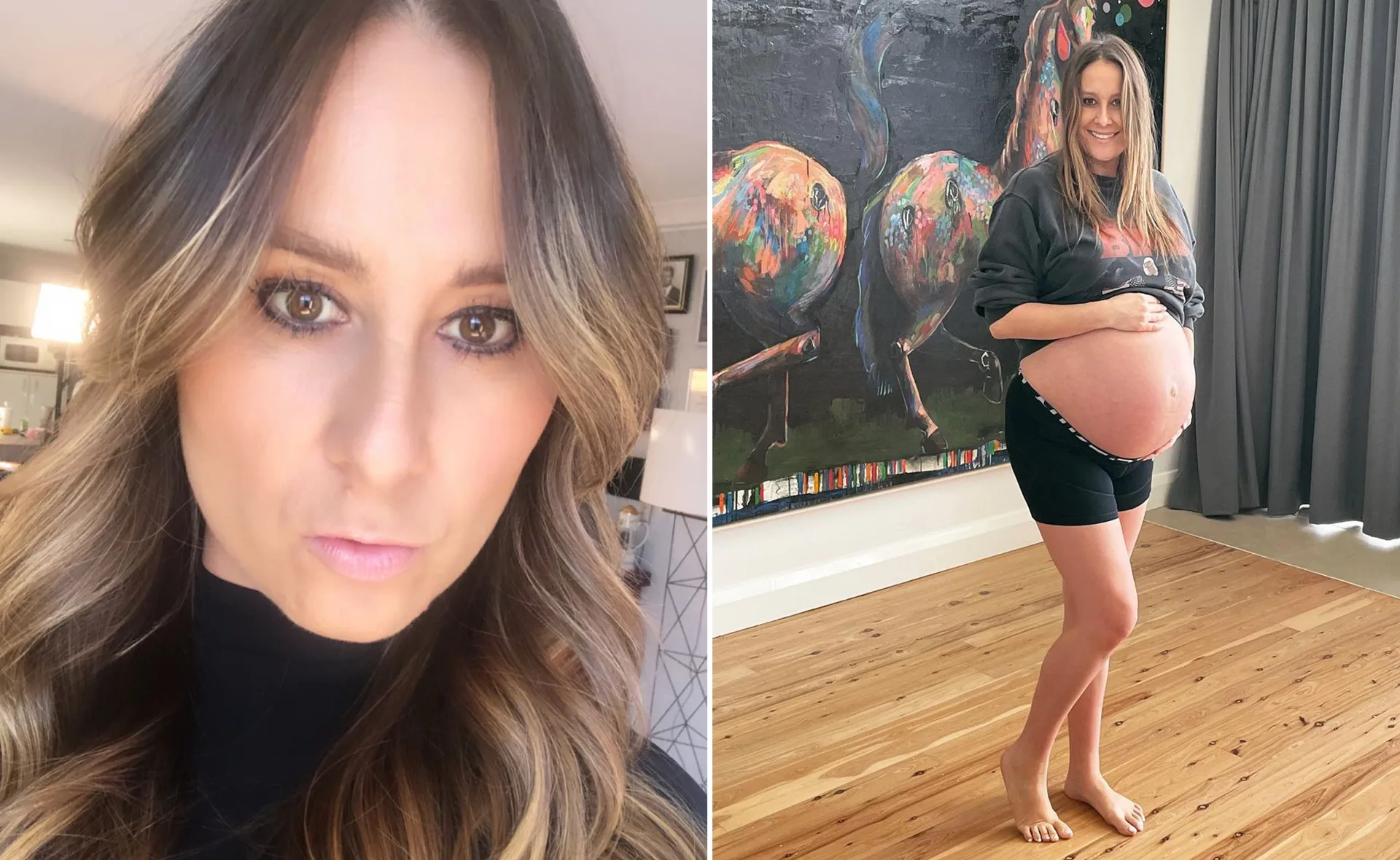 Pregnant woman in casual wear standing indoors, holding her belly, with a colorful abstract painting in the background.