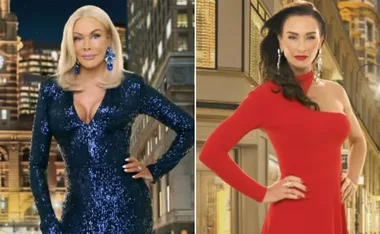 Two women in glamorous outfits, one in a blue sequined dress, the other in a red one-shoulder dress, posing confidently.