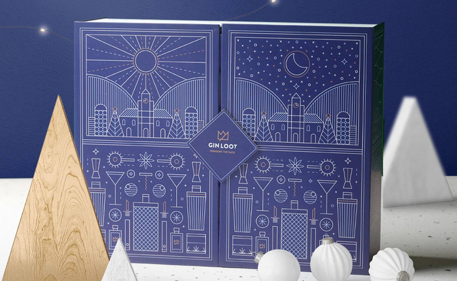 Gin Loot Advent calendar with festive blue design featuring sun and moon illustrations.