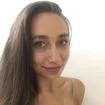 I don't know who this person is, but it shows a woman with long hair smiling at the camera.