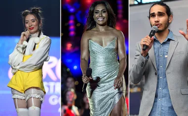 Three individuals performing: left in yellow outfit, center in silver dress holding a mic, right in grey blazer speaking.