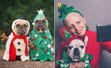 Two dogs dressed as a snowman and Christmas tree, woman takes selfie with dog in holiday sweater and red hat.