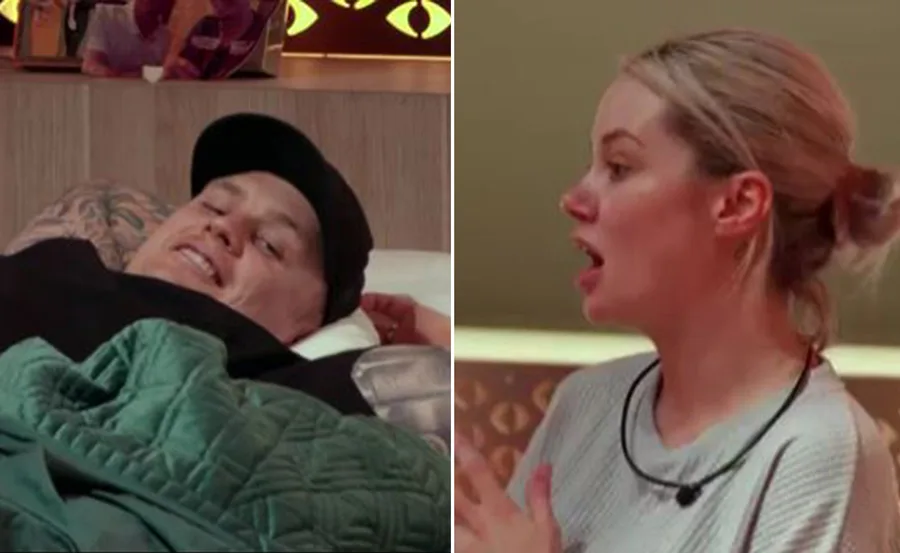 A man lies in bed, smiling, while a woman beside him gestures with an open mouth, appearing to be in conversation.