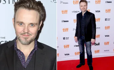 Man with light beard in patterned shirt and blazer at a film festival red carpet event.