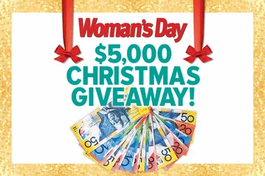 "Woman's Day $5,000 Christmas Giveaway banner with Australian banknotes and red bows."