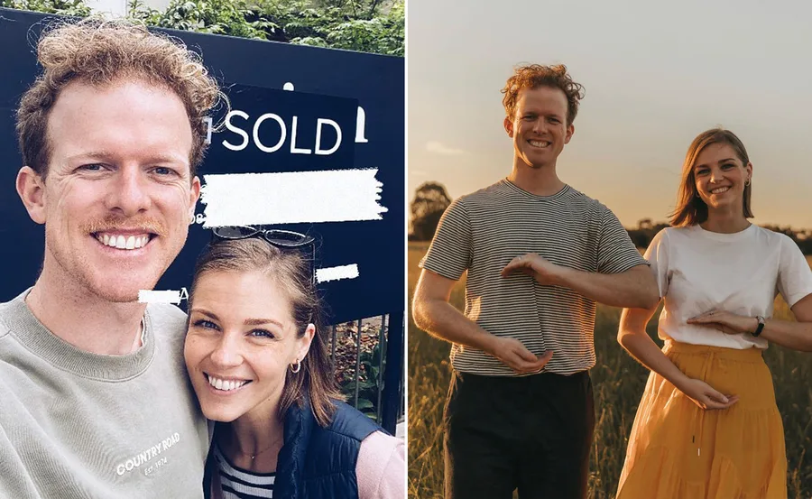 Couple smiling in front of "sold" sign and posing in a field, making heart shapes with hands.