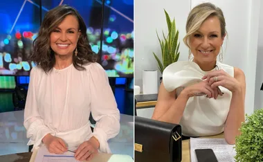 Two women in elegant white outfits sitting, with a blurred studio background on the left and plants on the right.