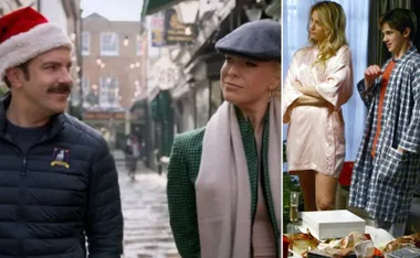 Characters from two TV shows in festive attire; one wears a Santa hat, the others in robes near Christmas gifts.