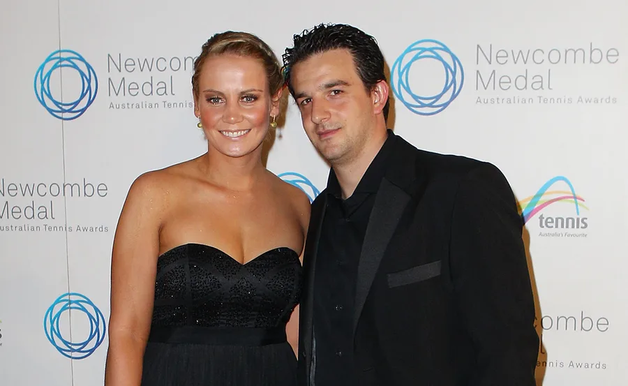 A man and woman in formal attire at the Newcombe Medal Australian Tennis Awards.