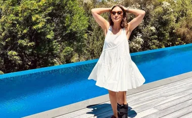 Hamish Blake attempts to nurse Zoë Foster Blake after she injures herself during their family holiday