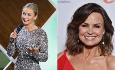 Two women side by side; one speaking into a mic wearing a sparkly dress, the other smiling in a red outfit.