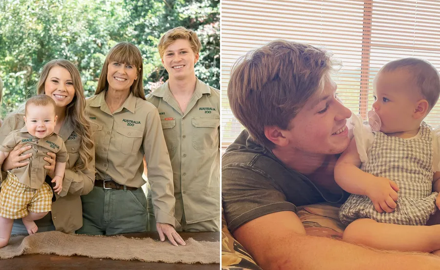 Irwin family in Australia Zoo uniforms; a young man plays with a baby indoors with soft lighting.