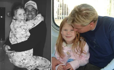 Father and young daughter sharing a joyful hug and tender moment.