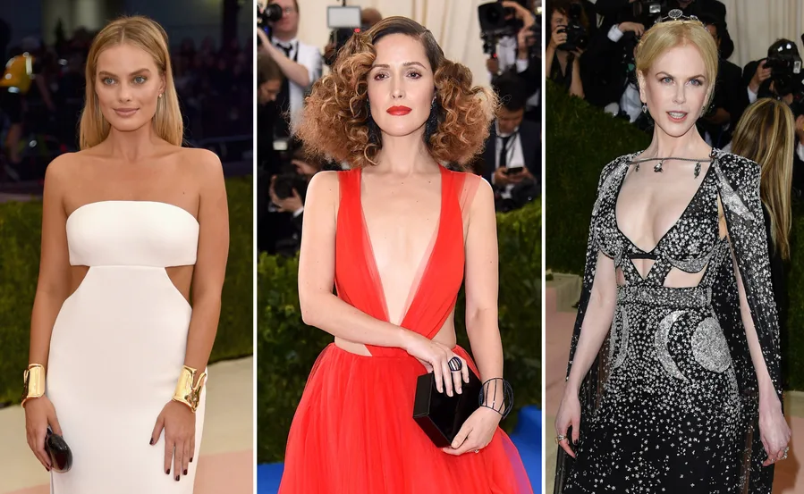 Three women on the Met Gala red carpet, each in distinct, elegant gowns.
