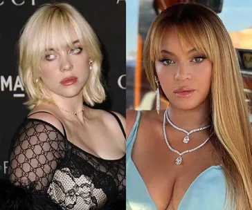 Two women side by side; one in a black lace dress, the other in a light blue outfit with jewelry.